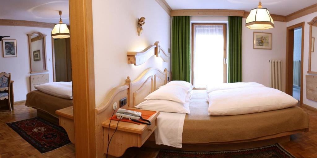 Hotel Dolomiti Madonna Ortisei Quarto foto